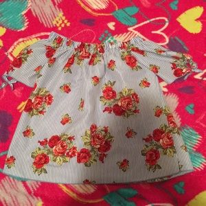 Off the shoulder rose shirt from dream girl.